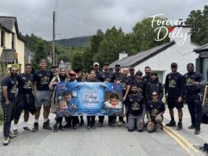 YFM colleague Raj and fellow participants at the start of a charity walk up Snowdon in support of Dilly's Hope, raising funds for children and young people.